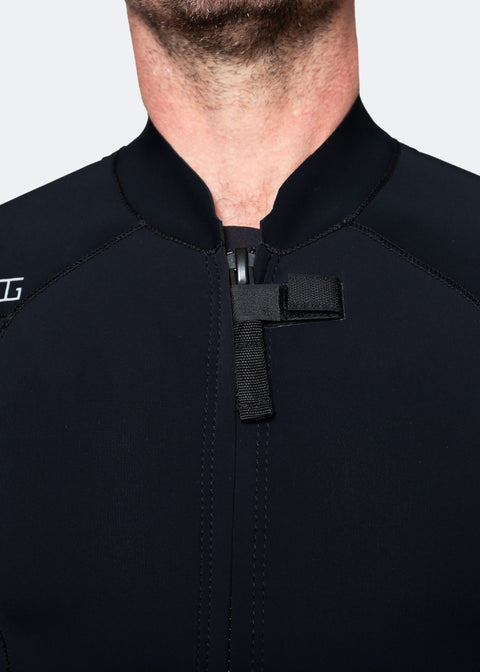 Close-up of a person wearing a black 00 BY XIIIG wetsuit jacket, with a XIIIG logo on the shoulder, showing the front zipper and zipper block on a white background