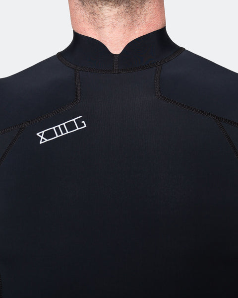 Close-up of a black 00 BY XIIIG Shinobi wetsuit jacket with a XIIIG logo on the right shoulder, on a white background
