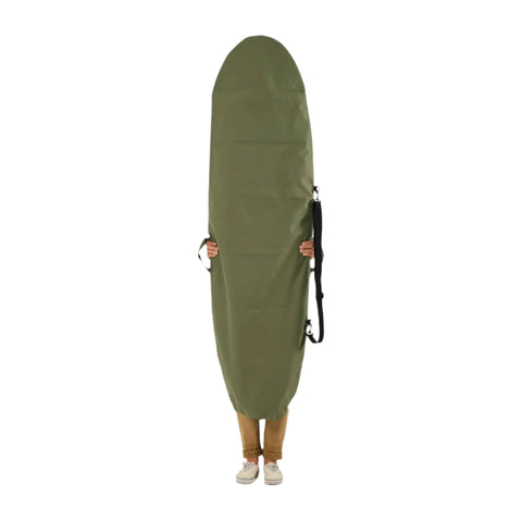 Green surfboard bag held by a person on a white background