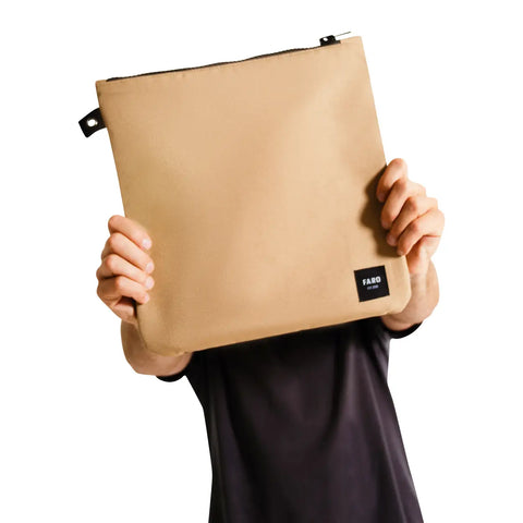 Beige fin wallet case held by a person with 'FARO' branding on a white background