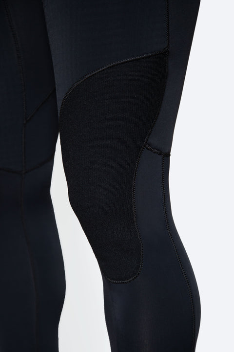 Close-up of a black wetsuit right knee pad on a white background