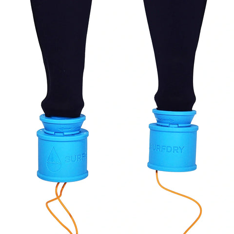 Blue SURFDRY with orange strings on a white background