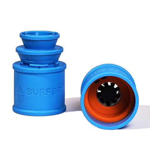 Blue collapsible SURFDRY container with orange interior, featuring the SURFDRY brand, on a white background.